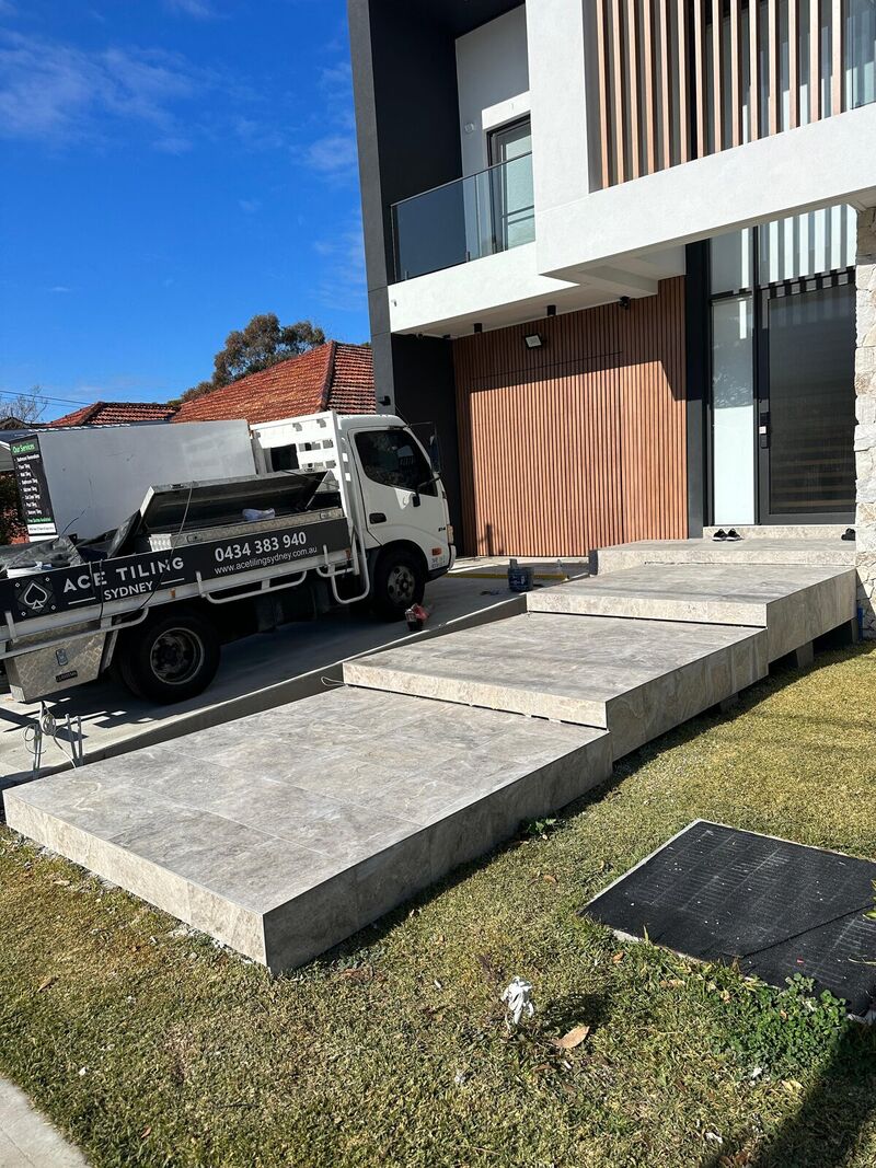 Ace Tiling Sydney truck beside a completed tiled entry